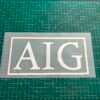 Sponsor Jersey AIG Putih Emas