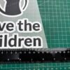 Sponsor Jersey Save The Children Hitam Putih